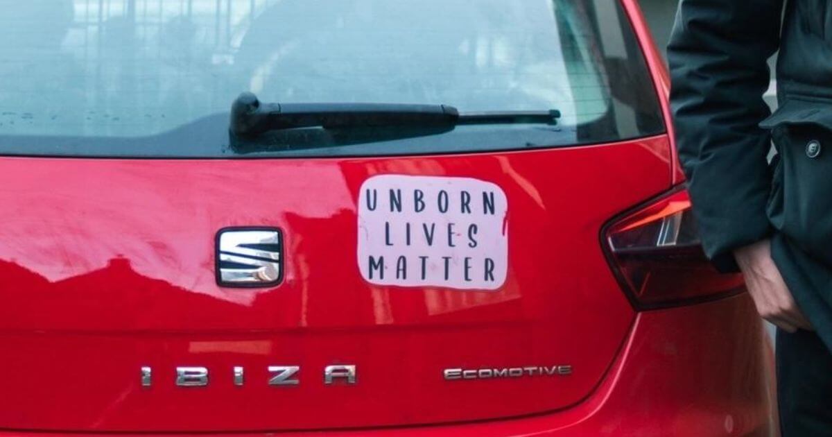 Priest charged for displaying ‘Unborn Lives Matter’ sticker on car parked in censorship zone