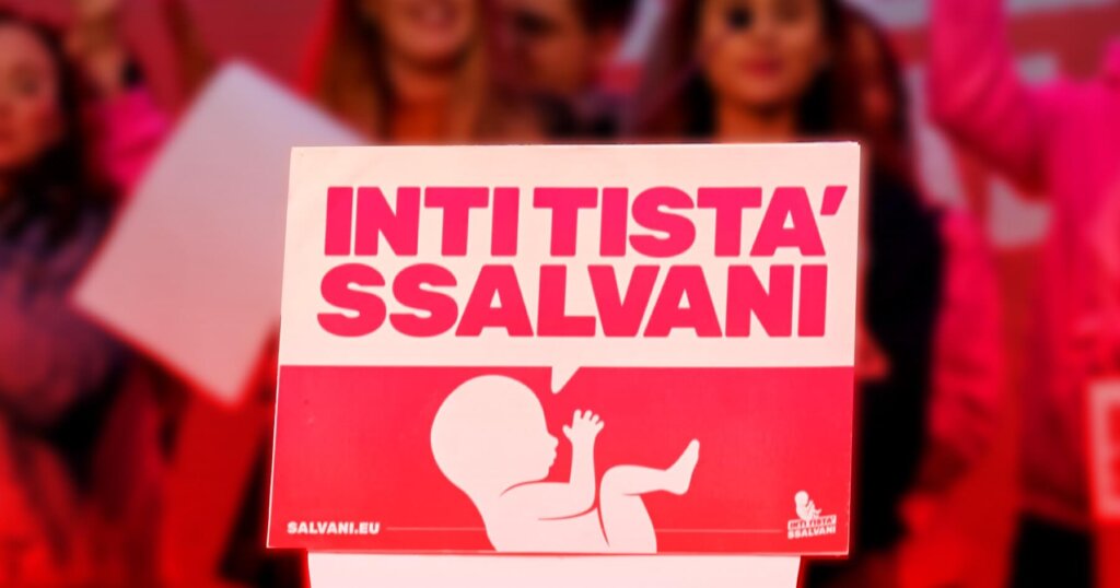 Placard displaying the campaign name Inti Tista Ssalvani which translates into English as You can save me cutout